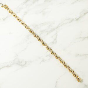 14k yellow and white gold infinity bracelet